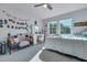 Cozy bedroom including a bed, loveseat, makeup vanity, and decorative items at 131 Swaying Palm Dr, Summerville, SC 29485
