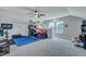 Bright bonus room with a ceiling fan and a basketball game setup with room for other activities at 131 Swaying Palm Dr, Summerville, SC 29485