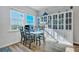 Dining room with built-ins, great natural light and wood-look floors at 131 Swaying Palm Dr, Summerville, SC 29485