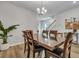Comfortable dining area featuring a wooden table and chairs, offering a warm and inviting atmosphere at 131 Swaying Palm Dr, Summerville, SC 29485
