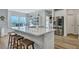 Kitchen island with seating, and quartz countertops at 131 Swaying Palm Dr, Summerville, SC 29485