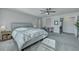Comfortable main bedroom with plush carpet, ceiling fan, natural light, and ample closet space at 131 Swaying Palm Dr, Summerville, SC 29485