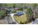 Aerial view of a home with a long driveway and yard surrounded by mature trees at 146 Picard Dr, Ladson, SC 29456