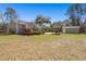 Large backyard with a deck, gazebo, shed, and hot tub offering great outdoor living at 146 Picard Dr, Ladson, SC 29456