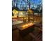 Backyard with a deck featuring a fire pit, gazebo and separate garage at 146 Picard Dr, Ladson, SC 29456