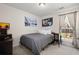 Inviting bedroom with large artwork, a ceiling light and natural light coming in from the windows at 146 Picard Dr, Ladson, SC 29456