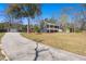Well-maintained home with a detached garage, complemented by a spacious driveway at 146 Picard Dr, Ladson, SC 29456