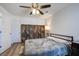 Bedroom featuring a bed, wooden accents and natural light from the window at 156 Woodward Rd, Goose Creek, SC 29445
