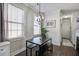 Bright dining area featuring modern table and seating with natural light and decor at 156 Woodward Rd, Goose Creek, SC 29445