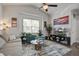 Inviting living area with comfortable seating, a modern rug, and plenty of natural light at 156 Woodward Rd, Goose Creek, SC 29445