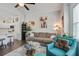 Cozy living room with stylish furnishings and an open view to the kitchen at 156 Woodward Rd, Goose Creek, SC 29445