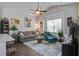 Bright living room featuring a plush sofa, stylish armchair, and elegant decor at 156 Woodward Rd, Goose Creek, SC 29445