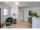 Sitting area in the loft featuring a chair, accent table and open access to other rooms at 156 Woodward Rd, Goose Creek, SC 29445