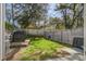 Private fenced backyard, offering green grass and space for outdoor activities and relaxation at 158 Spencer Cir, Summerville, SC 29485