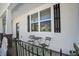 Charming front porch sitting area with natural light at 158 Spencer Cir, Summerville, SC 29485