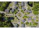 A beautiful aerial view of the property and neighborhood showing roundabout and access to Hwy 17 and Bees Ferry at 1587 Bluewater Way, Charleston, SC 29414