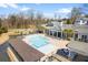 Aerial shot of the community pool and clubhouse area, perfect for recreation and relaxation at 1587 Bluewater Way, Charleston, SC 29414