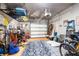 Spacious garage with overhead storage and plenty of room for tools and equipment at 1587 Bluewater Way, Charleston, SC 29414