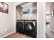 Convenient laundry closet with modern, front-loading washer and dryer at 1587 Bluewater Way, Charleston, SC 29414