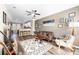 Open-concept living room flowing into the kitchen, featuring a comfortable seating area with modern decor and ample light at 1587 Bluewater Way, Charleston, SC 29414