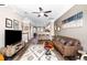 Spacious living room seamlessly connects to a modern kitchen, creating an open and inviting living space at 1587 Bluewater Way, Charleston, SC 29414