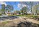 An expansive backyard with mature trees provides a private and serene setting at 159 Foxborough Rd, Goose Creek, SC 29445