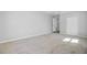 A spacious, carpeted bedroom with a neutral color palette and closet storage at 159 Foxborough Rd, Goose Creek, SC 29445