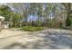 Expansive driveway with views of the wooded surroundings of this wonderful property at 159 Foxborough Rd, Goose Creek, SC 29445