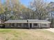 Charming brick home with a well-maintained lawn and a newly installed dark roof at 159 Foxborough Rd, Goose Creek, SC 29445