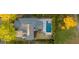 From above, see how the private backyard pool and patio extends the luxury living space of this stylish home at 171 Cartright St, Charleston, SC 29492