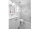 Bathroom features white vanity, glass shower, decorative floor tiles and modern fixtures at 171 Cartright St, Charleston, SC 29492