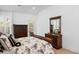 Bright bedroom features wood floors, closet, and outdoor access with a view of the outdoor patio at 171 Cartright St, Charleston, SC 29492