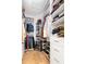Organized walk-in closet with shelving and drawers for ample storage and hardwood floors at 171 Cartright St, Charleston, SC 29492