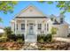 Charming home featuring a welcoming front porch and a well-manicured lawn at 171 Cartright St, Charleston, SC 29492
