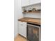 Kitchen includes a wine and beverage refrigerator with custom cabinets and countertops at 171 Cartright St, Charleston, SC 29492