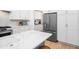 Bright kitchen featuring a marble top island, stainless steel appliances and shaker style cabinets at 171 Cartright St, Charleston, SC 29492