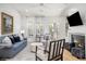 Cozy living room featuring hardwood floors, a fireplace, and plush seating at 171 Cartright St, Charleston, SC 29492