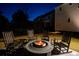 Cozy outdoor fire pit area with comfortable seating, perfect for entertaining and enjoying cool evenings at 171 Cartright St, Charleston, SC 29492
