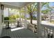 Inviting outdoor living space on a covered front porch with shade and fresh air at 171 Cartright St, Charleston, SC 29492