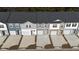 An aerial view of newly constructed townhomes showcases varied exterior paint and landscaping details at 1903 Scarlett Maple St, Summerville, SC 29486