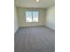 Bright and airy bedroom featuring neutral carpet, a window and fresh paint to suit any decor at 1903 Scarlett Maple St, Summerville, SC 29486