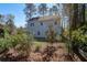 Backyard featuring the back of the house with a fenced in yard at 1926 Grimball Rd, Charleston, SC 29412