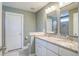 Well-lit bathroom with double sinks, granite countertops, and a spacious layout at 1926 Grimball Rd, Charleston, SC 29412