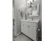 Bright bathroom featuring a modern vanity, marble countertop, stylish mirror, and neutral color scheme at 200 Bucksley Ln # 308, Charleston, SC 29492