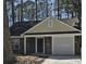 Brick home with attached garage, inviting curb appeal at 212 Regent St, Summerville, SC 29483
