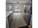 Kitchen featuring wood-look tile flooring and stainless steel appliances at 212 Regent St, Summerville, SC 29483