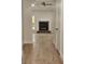 Spacious living room featuring wood floors, a ceiling fan and a classic fireplace at 212 Regent St, Summerville, SC 29483