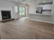 Open floor plan with view of fireplace and kitchen at 212 Regent St, Summerville, SC 29483