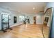 This gym features hardwood floors, natural light and workout equipment and weights at 2415 Jasper Patterson Dr, Johns Island, SC 29455