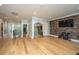 This living room features hardwood floors and a large decorative mirror at 2415 Jasper Patterson Dr, Johns Island, SC 29455
